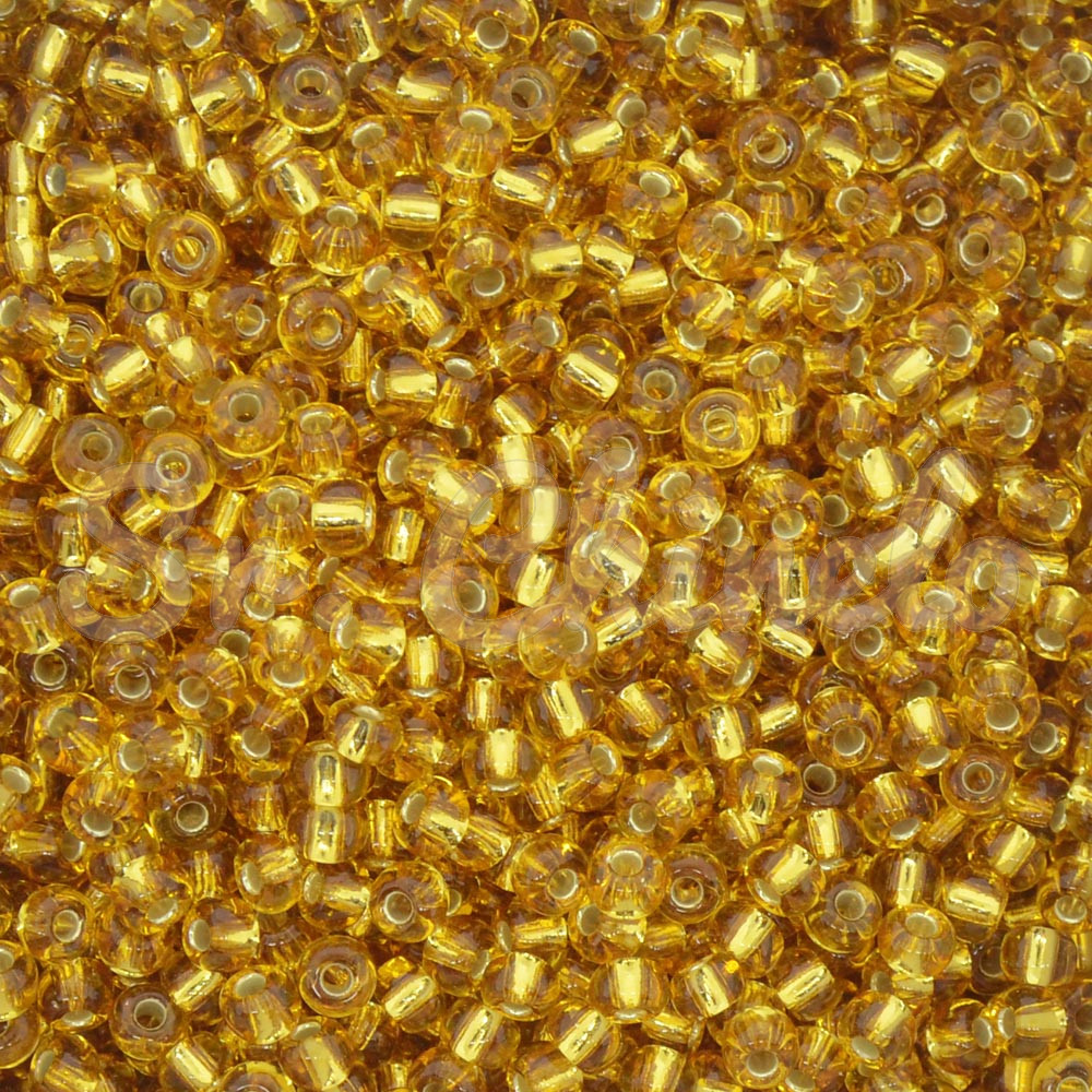 Miçangão Jablonex, 6/0, Ouro Médio Transparente